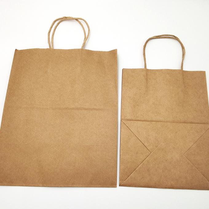 Bolsa de embalagem de papel Kraft Bolsos de presente de artesanato de compras Bolsa biodegradável com alça torcida 1