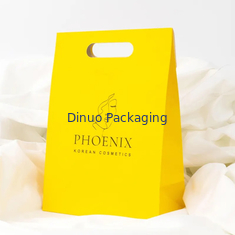 Embalagem de roupas Porta de corte a óleo de compras Bolsa de papel Kraft Bolsas de presente amarelas personalizadas