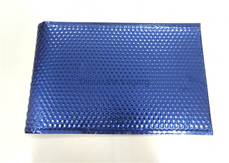Envelope acolchoado dos encarregados do envio da correspondência da bolha dos azuis marinhos porte postal metálico para o empacotamento do correio