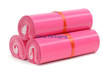 O enviamento Co-ex dos sacos da cor do rosa envolve o à prova de água para o transporte