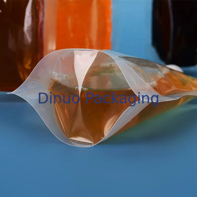 A impressão feita sob encomenda do Gravure levanta-se a bebida transparente Juice Spout Pouch dos malotes líquidos