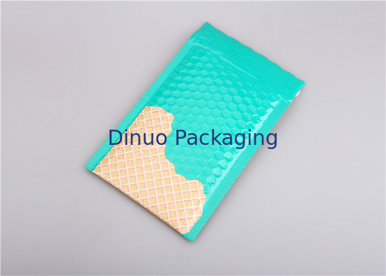 Os encarregados do envio da correspondência metálicos azuis da bolha do lago acolchoaram o #C dos envelopes 145x210mm para o batom