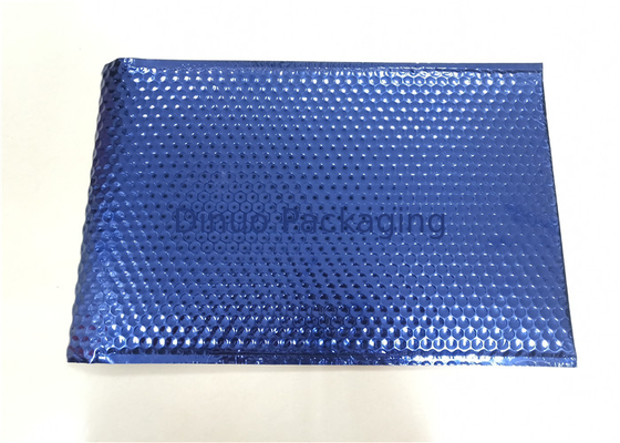 Envelope acolchoado dos encarregados do envio da correspondência da bolha dos azuis marinhos porte postal metálico para o empacotamento do correio