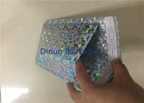 O pacote acolchoado encarregados do envio da correspondência colorido holográfico do invólucro com bolhas de ar ensaca impermeável